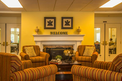 Cozy sitting area with welcoming decor and a fireplace