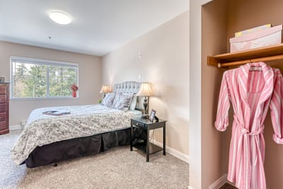 Cozy resident room with a bed and decor