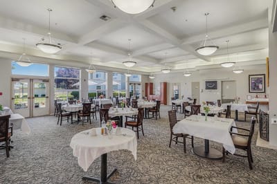 Well-decorated dining room set for residents