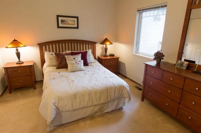 Cozy bedroom with warm lighting and furnishings