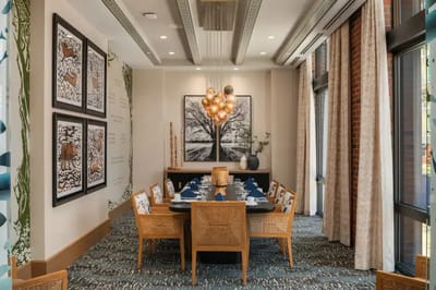 Elegant dining room with decorative lighting and seating