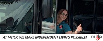 Staff member interacting with residents on facility transport