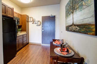 Cozy private room with dining area and artwork