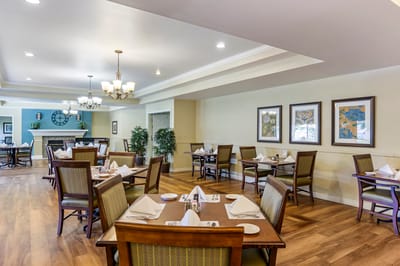 Dining area with neatly arranged tables and decor