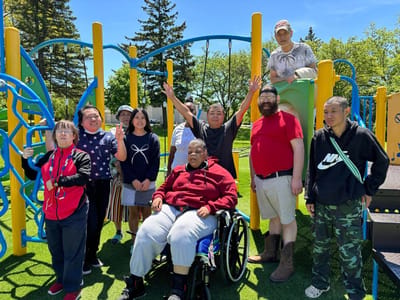 Residents enjoying an outdoor activity at a playground