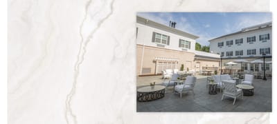 Outdoor patio area with seating and umbrellas