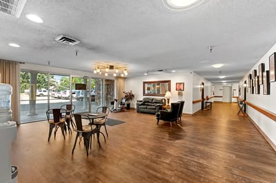 Dining area and lobby with seating and decor