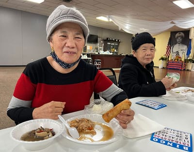 Residents enjoying a meal in the dining area