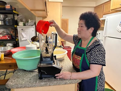 Senior preparing food in a kitchen setting