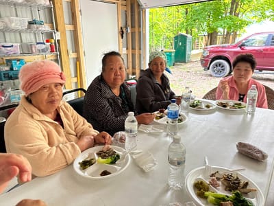 Residents enjoying a meal together at a table