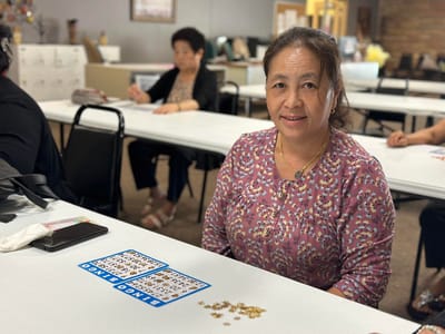 Resident engaged in a bingo game activity