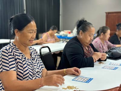 Residents participating in a bingo activity.