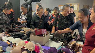 Residents browsing items at a community event