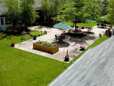 View of landscaped outdoor space with seating areas