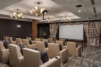 Interior view of a movie theater room with seating