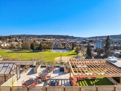 Outdoor terrace with seating and scenic views