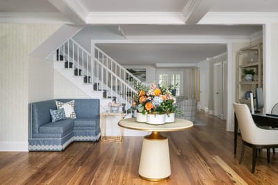 Interior view of a welcoming common area with floral decor