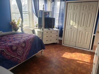 Private bedroom with furniture and natural light