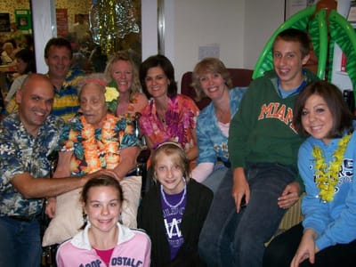 Residents and staff celebrating together in a common area