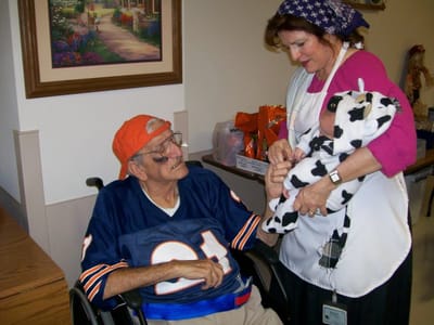 Staff member interacting with a resident in a common area