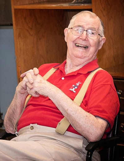 Smiling elderly man in a casual setting