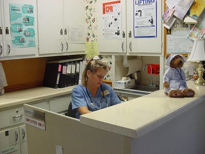 A staff member at the nursing station