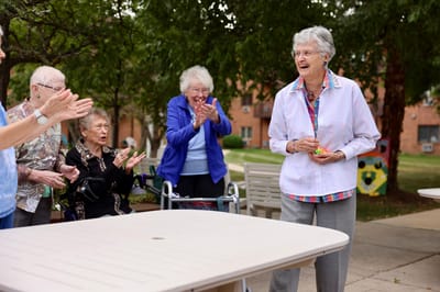 Residents engaging in a lively outdoor activity
