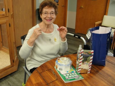 Resident engaging in an activity with a smile