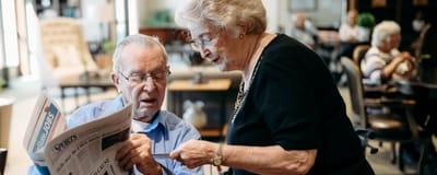 Residents engaging in conversation in a common area