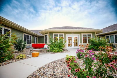 Beautiful outdoor courtyard with flowers and seating