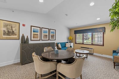 Bright common area with seating and artwork