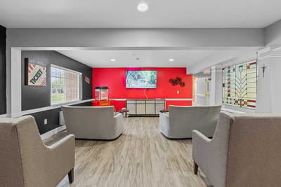 Common area with seating and television