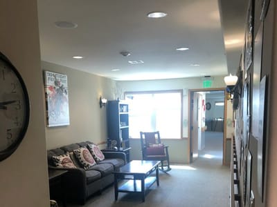 Interior view of a cozy common area with seating