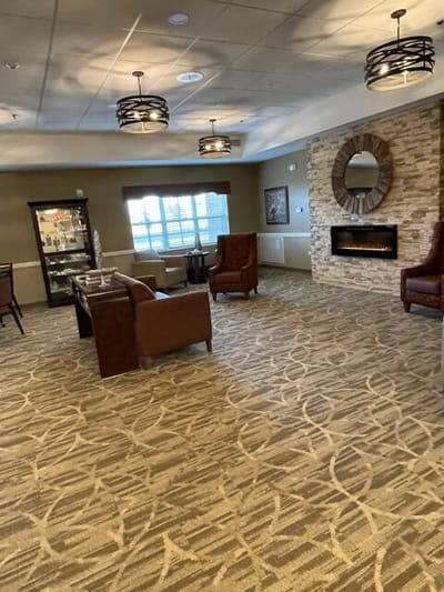 Interior view of a cozy common area with seating
