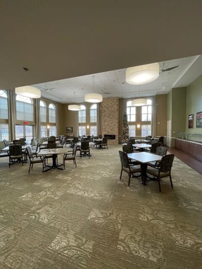 Bright dining area with tables and chairs
