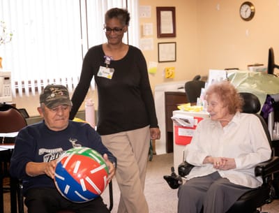 Residents participating in a recreational activity indoors