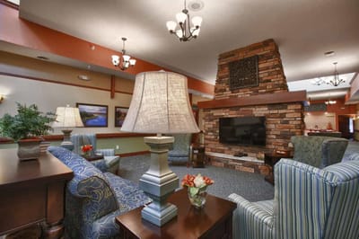 Cozy common area with a fireplace and seating