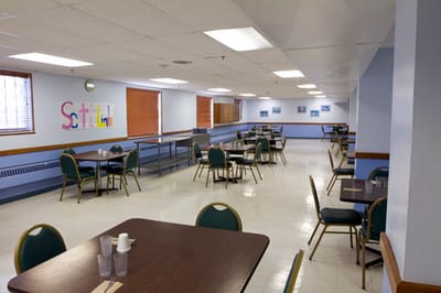 Dining area with tables and chairs set up