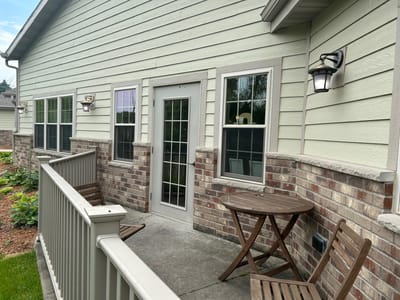 Outdoor seating area with a view of the building