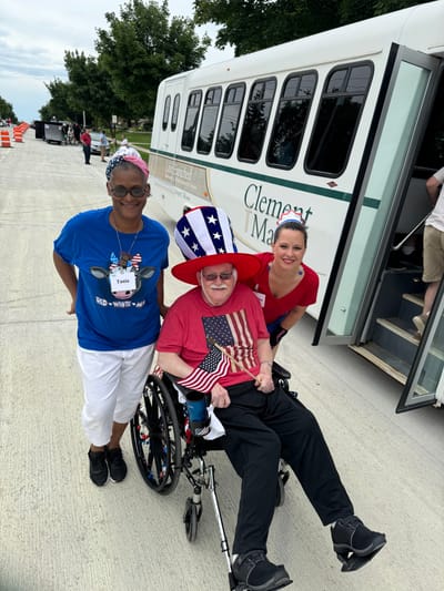 Residents and staff celebrating with patriotic attire