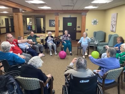 Residents engaged in a group activity in a common area