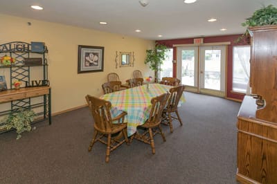 Dining area with a large table and chairs