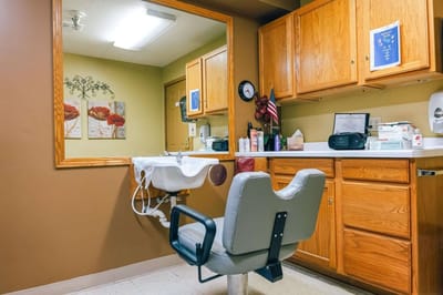 Interior view of a salon area with styling chair