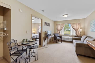 Cozy interior of a resident room with seating area