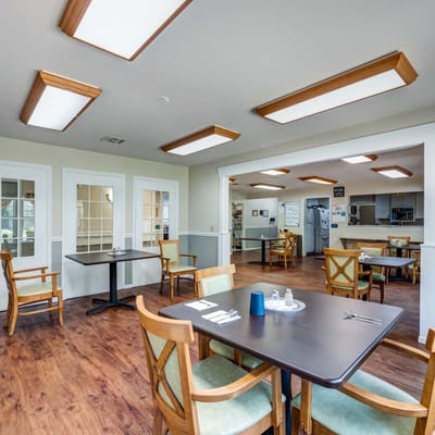 Dining room with wooden tables and chairs
