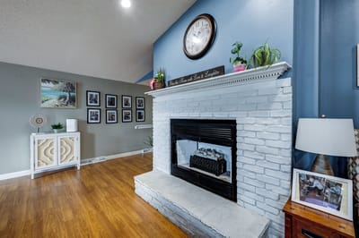 Cozy common area with a fireplace and wall decor
