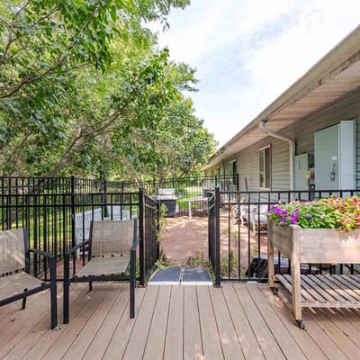 Outdoor space with seating and flower planters