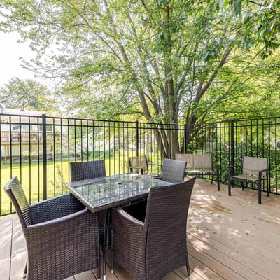 Outdoor seating area surrounded by greenery