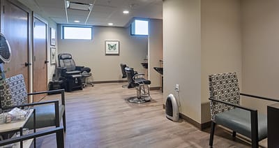 Beauty salon interior with styling chairs and mirrors