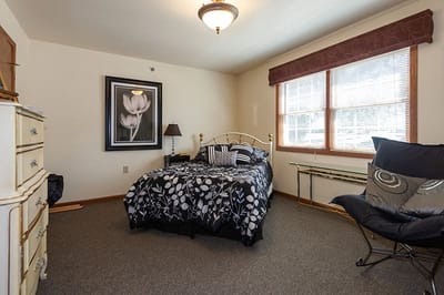 Cozy private resident room with floral decor